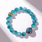Buddha Stones 10mm Natural Blue Chalcedony Positive Bead Bracelet