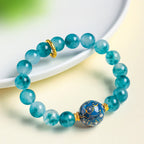 Buddha Stones 10mm Natural Blue Chalcedony Positive Bead Bracelet